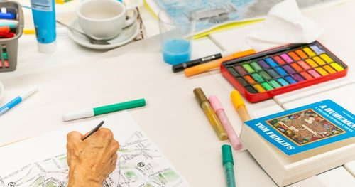 Craft materials and painting materials on a table