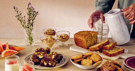 Photo of a selection of cakes, biscuits and desserts from Honey & Co.