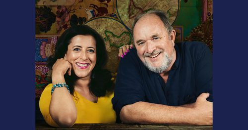 photo of Anita Anand and William Dalrymple smiling at camera
