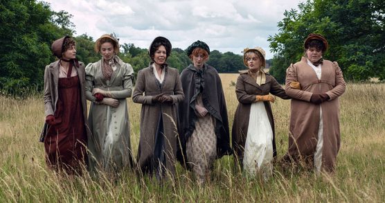 Six ladies in Georgian costume in a line