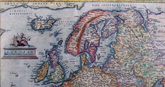 A fragment of historical map of Europe by Abraham Ortelius showing parts of Scandinavia, the British Isles, and northern Russia, including a decorative cartouche of the figure of Europa riding a bull.