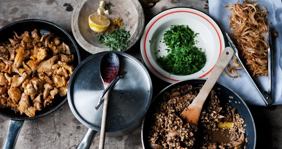 Image of food in saucepans and small plates