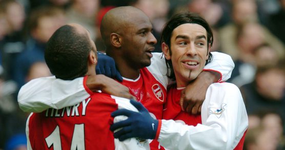 Arsenal players Theirry Henry, Patrick Viera and Robert Pires celebrating