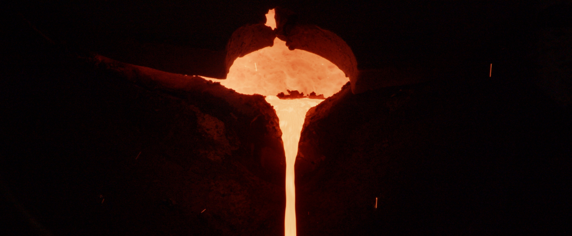 Molten metal pouring downwards