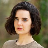 Photo of Jenny Wall, dark hair in a bob style