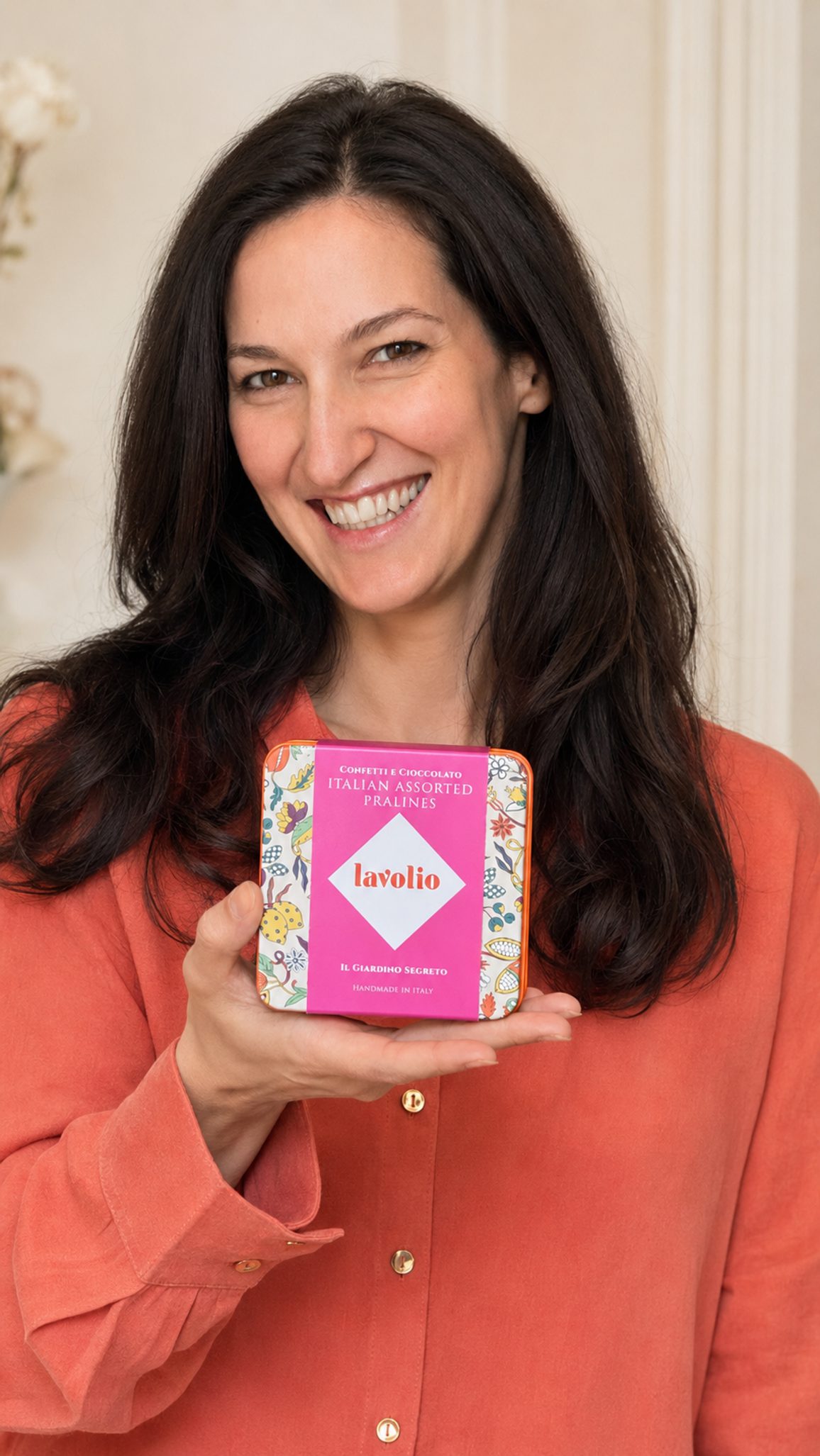 Photo of Lavinia Davolio holding a box of Lavolio chocolates.