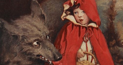 An illustration of a girl wearing a red cape with a hood, holding a picnic basket and looking over her shoulder at a black wolf with it's fang and tongue exposed.