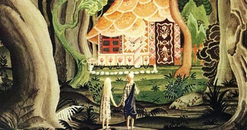 Two children outside of a gingerbread house in a dark forest.