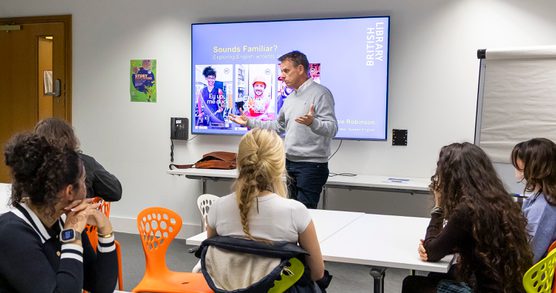 Lead Curator of Spoken English, Jonnie Robinson, running the Sounds Familiar workshop to a group of students.