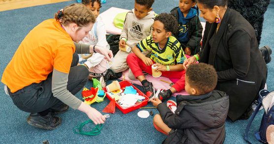 Group of children exploring creative art materials
